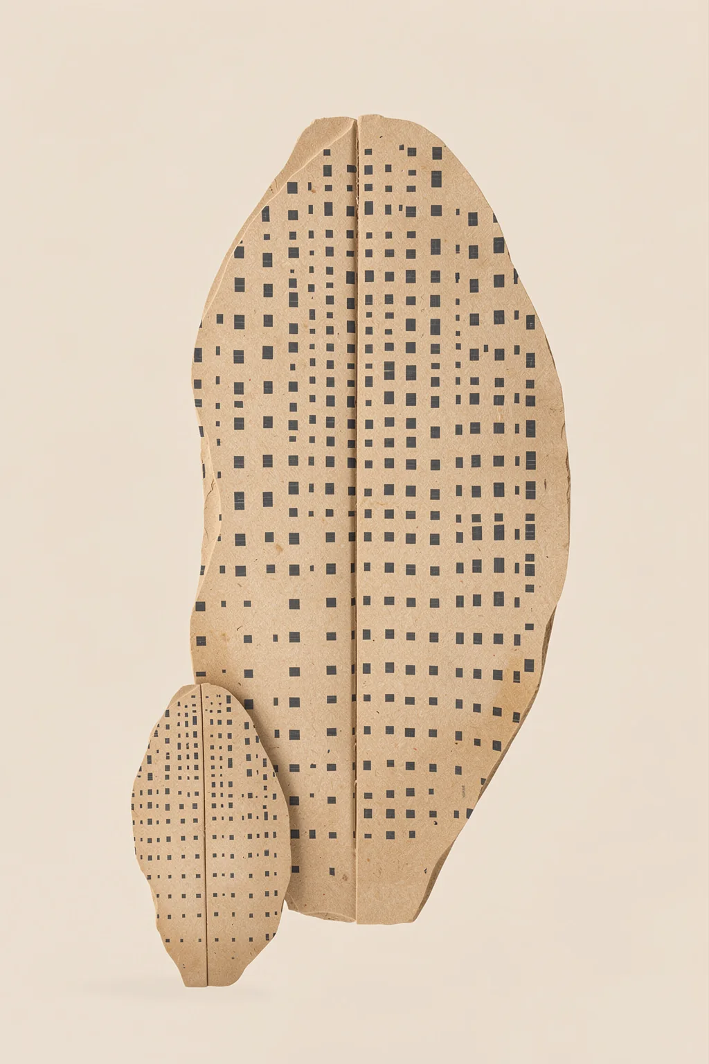 Organic Patterned Shapes in grey green on beige.. Two upright tan leaf-like shapes covered in small dark squares overlap against a pale beige background.