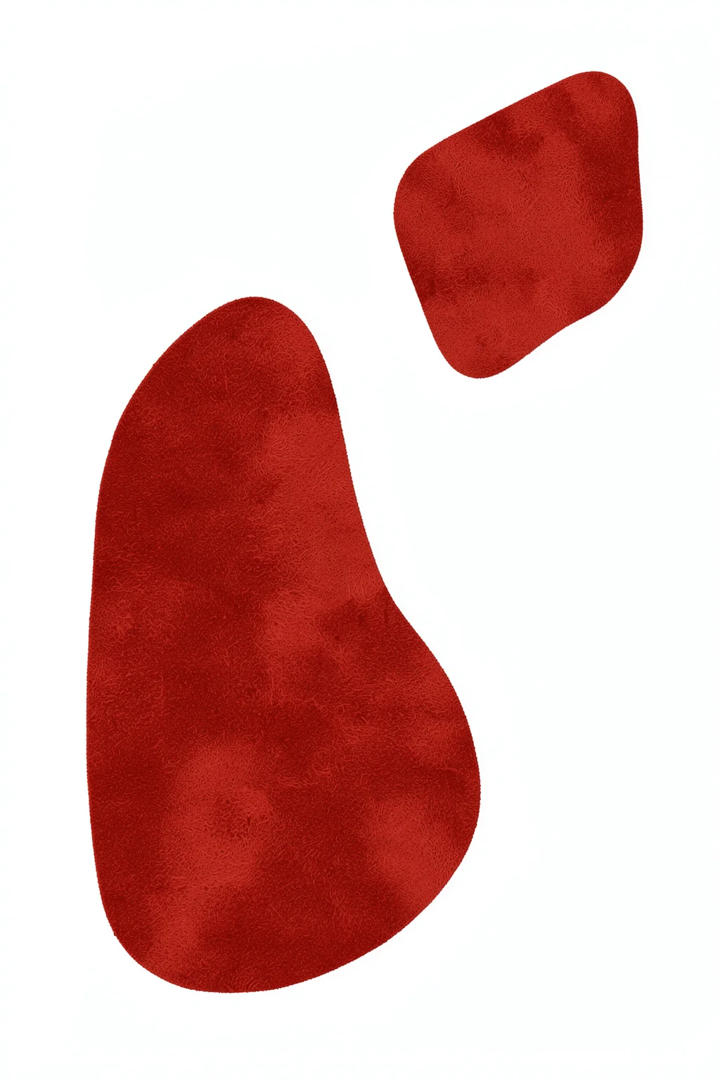 Abstract Red on white. Two separate textured red organic shapes float on a plain white background.