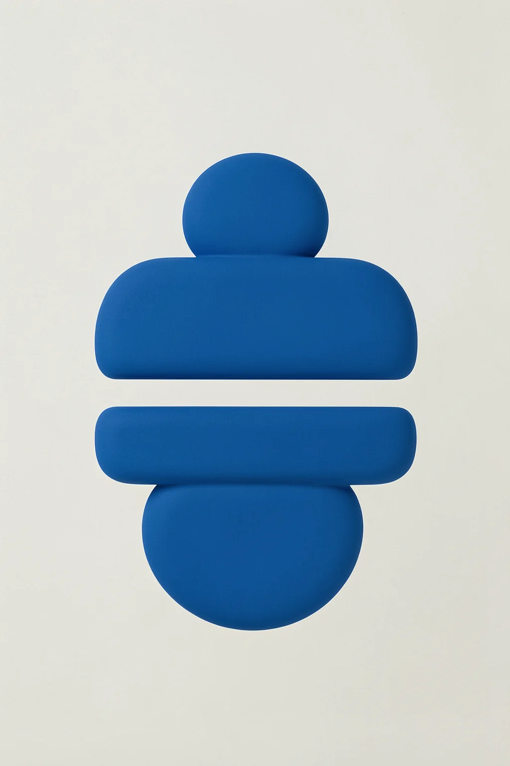 Blue Abstract Forms. Rounded cobalt-blue geometric forms are stacked in a compact abstract arrangement on off-white.
