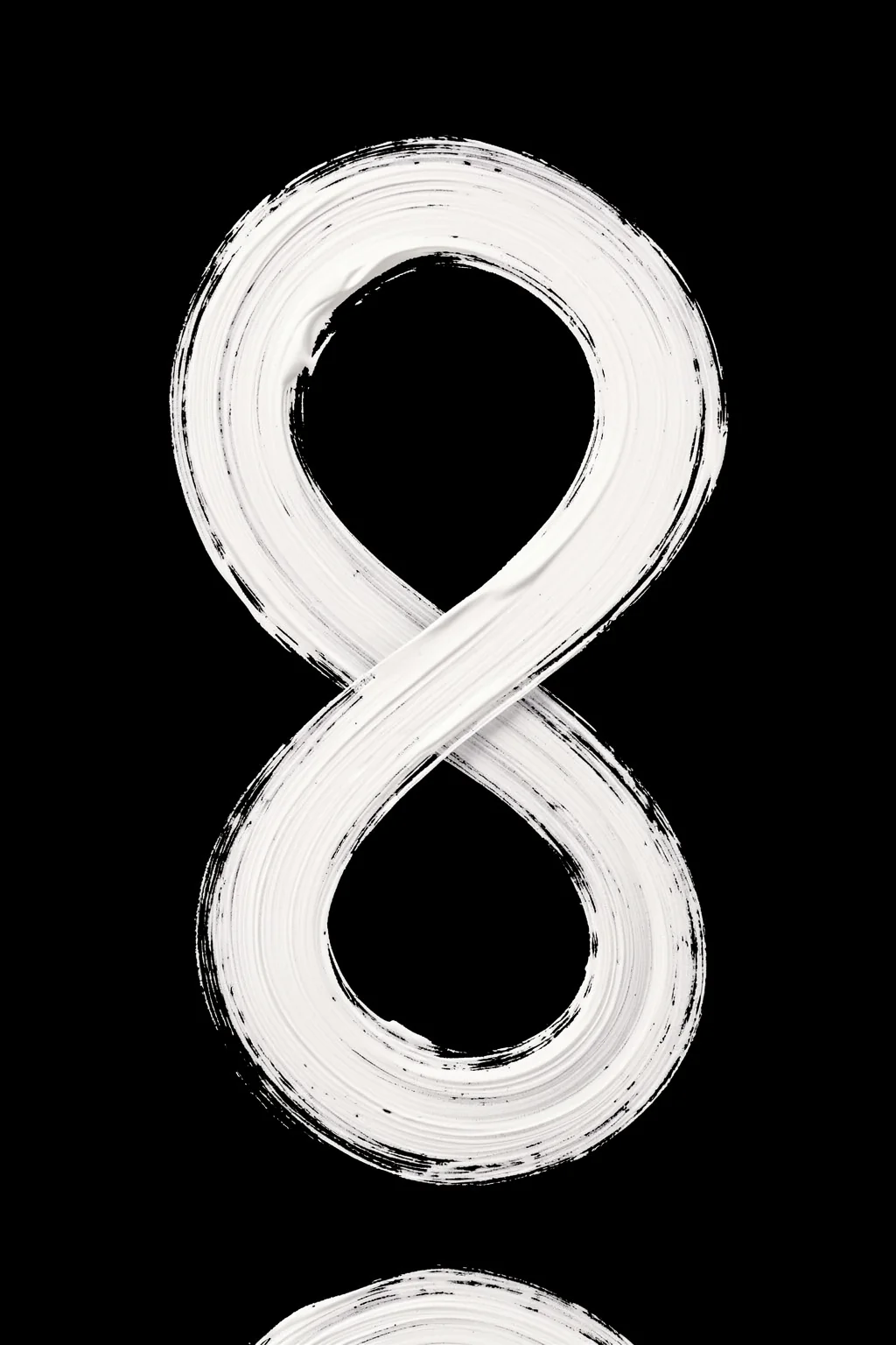 negatives_006_and. A broad white brushstroke loops into an infinity-like figure against a solid black background.