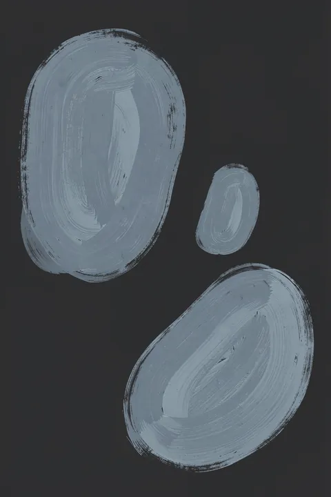 Studiopalette Flexa Blue Family Copy. Three loosely brushed blue-gray oval forms are spaced across a charcoal background.
