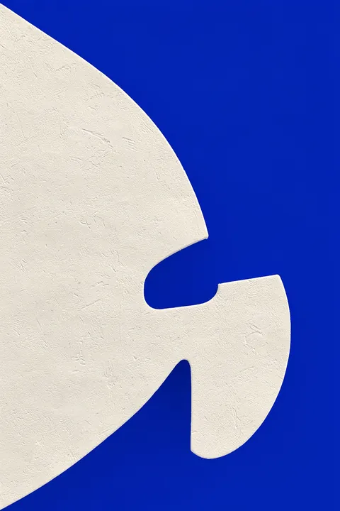 Modern Blue Curves. Broad textured cream curves sweep across a vivid cobalt-blue background.