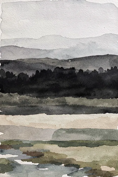 Misty Mountain Layers. Layered gray watercolor ridges and a dark tree line stretch across a softly textured monochrome landscape.