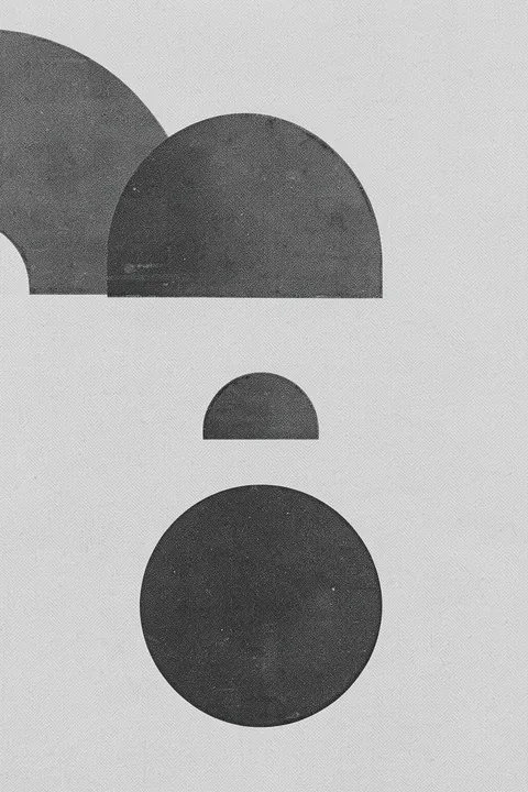 Geometric Harmony. Charcoal semicircles and circles are arranged vertically on a pale gray textured field.