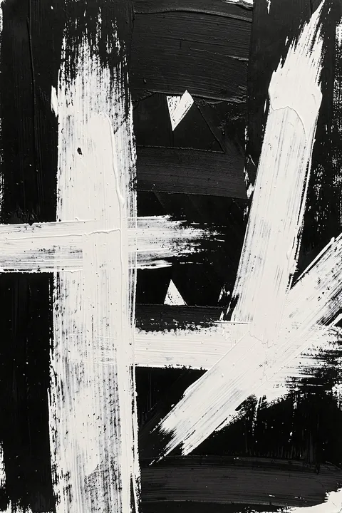 Monochrome Brushstrokes. Broad black and white brushstrokes cross in an energetic abstract composition with sharp triangular gaps.