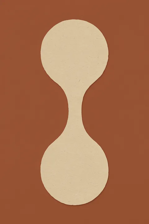 Earthy Abstract Shape. A pale ivory form, rounded at each end and pinched at the centre, stands on a muted terracotta background.