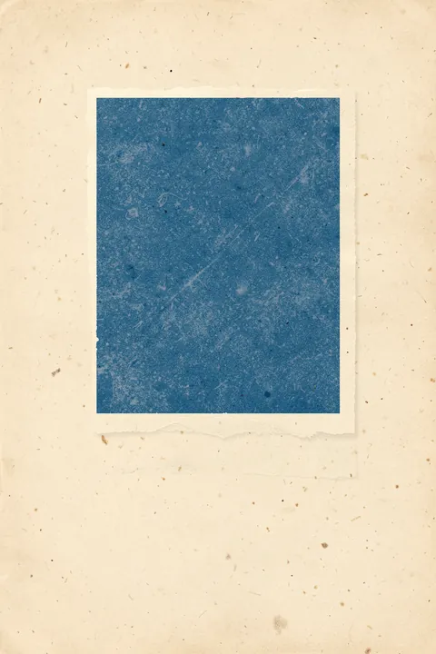 Blue Square Abstract. A textured blue square sits within a roughly torn-edged cream paper field.