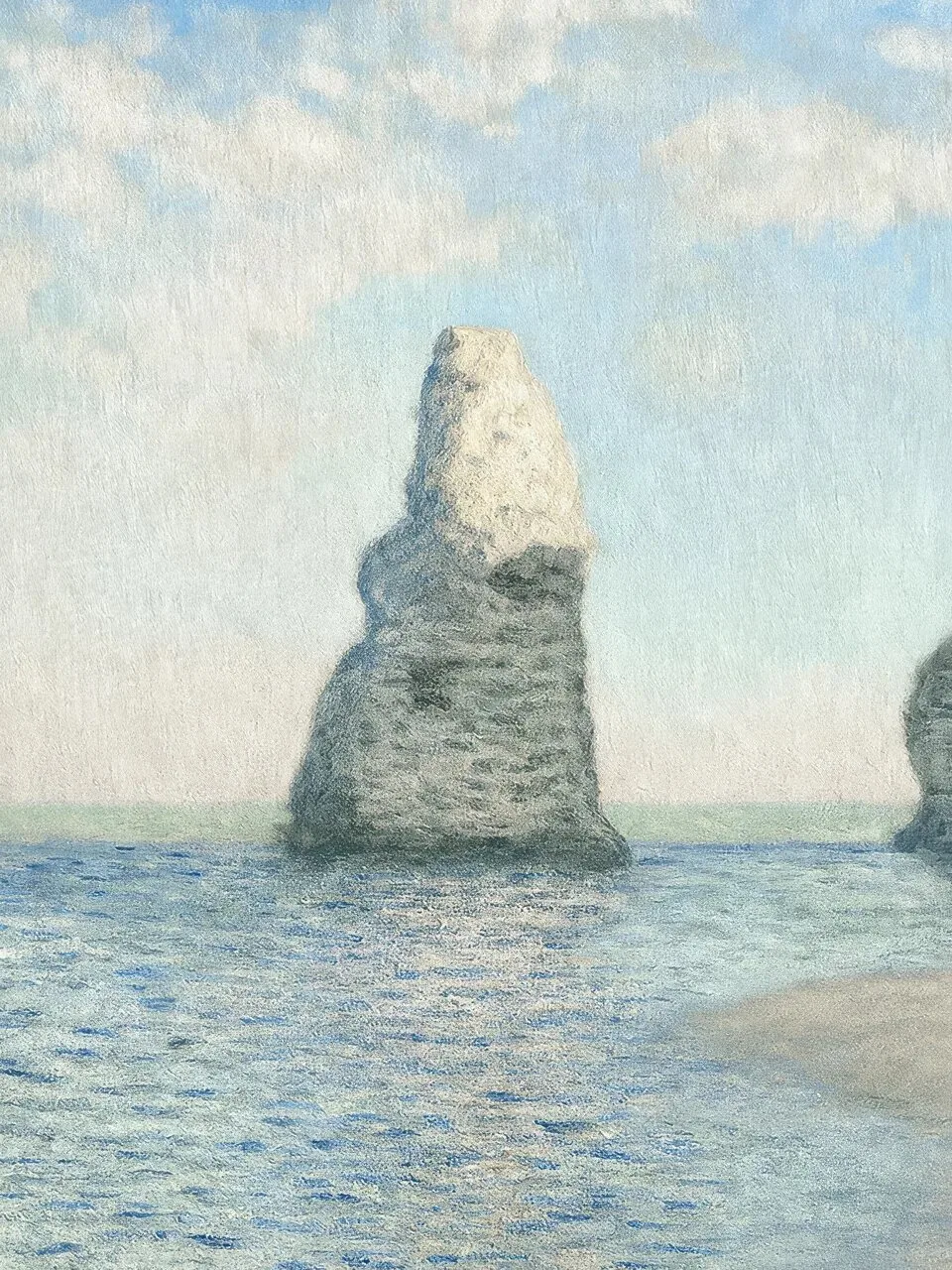Onlly poster, Sea Stack beneath a Cloudy Sky: A solitary rocky sea stack rises from calm water beneath a pale sky.