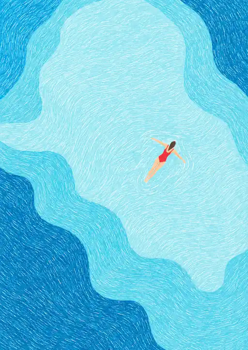 Overhead view of a red-suited swimmer floating in a turquoise pool with layered blue waves.