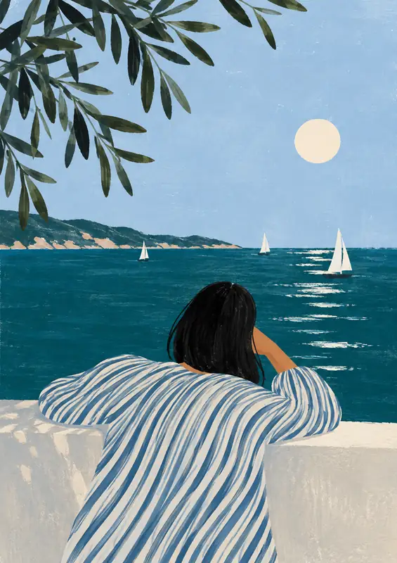 Woman in a striped blouse rests on a stone ledge, looking out at sailboats on a deep teal sea.